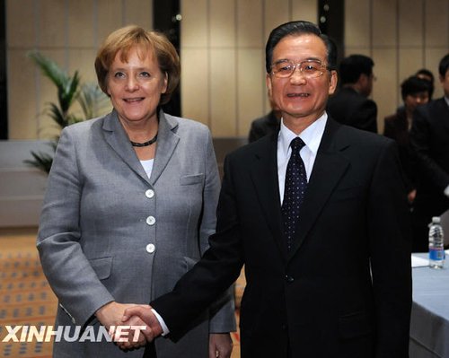 中國國務(wù)院總理溫家寶在哥本哈根會見德國總理默克爾